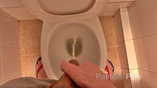 Pissing in a public toilet