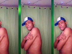 Elegant and sensual man smiling and moving his body to the rhythm of sensuality