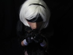 Silicone doll with 2B cosplay gives blowjob to strapon