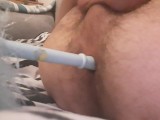 Skinny twig inserts a homemade dildo up his small tight hole