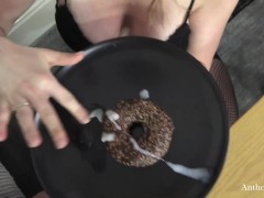 Blonde teen sucking cock and eating doughnut with cum