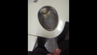 pissing on a train
