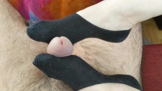 Sockjob with the most voted pair: Black Peds! Cum inside sock