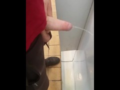 Hung lad at urinal next to me gets semi while pissing!