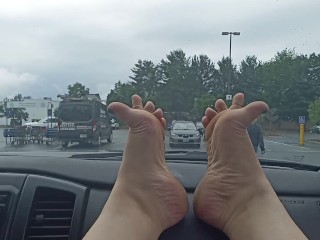 Bare feet in the grocery store parking lot