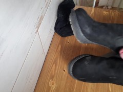 Cumming on her ankle boots