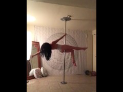 Pole dancing topless at home