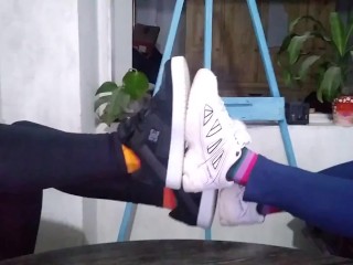 Two Girls Comparing SHOES Ans SOCKS