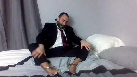 Gagged and Showing off in a Suit