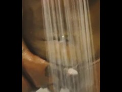 Ebony girl plays with her Big Clit in shower