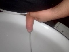 Man piss with an erection