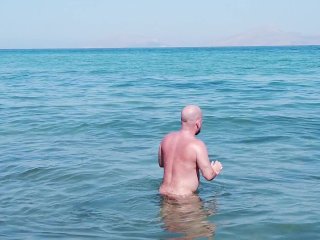 Gay nudist beach swimmer