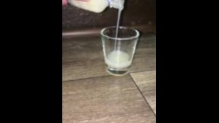 dipping my dick into a shot glass full of my own cum that I froze and thawed 1