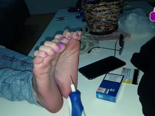 I tease my wife's feet while she tries to rest