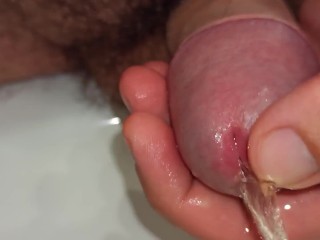 Close up Pissing and Playing with Peehole