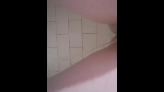 Teen girl pissing in the shower