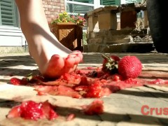 Sexy half Asian girl tramples fruit with her feet