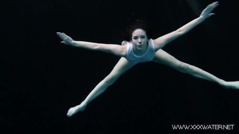 Andrejka swims naked in the pool