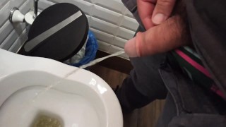 Peeing in a public toilet