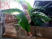 Preview 3 of Rural striptease. Country girl dancing in the yard of her house  Rustic striptease with banana leaf