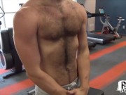 Preview 2 of RawFuckBoys - Young hairy stud strokes big cock solo after hot workout