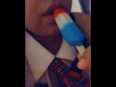 EATING A POPSICLE IN SCHOOL GIRL OUTFIT! WISH IT WAS YOUR DICK
