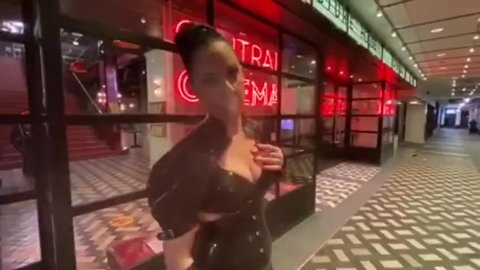 Lady Bellatrix walks the streets of London in latex