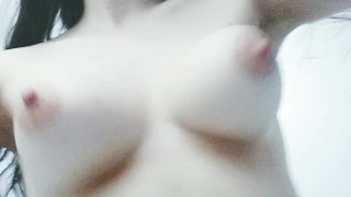 Bouncing my pale natural boobs from a funny angle.