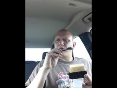 piggy eating cake in car