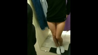 A schoolgirl in sexy lingerie tries on outfits before September 1. fitting room