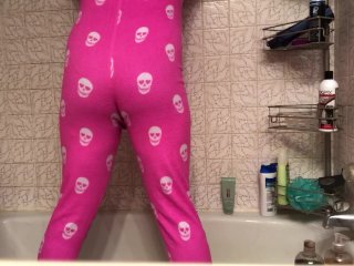 Peeing her pajamas