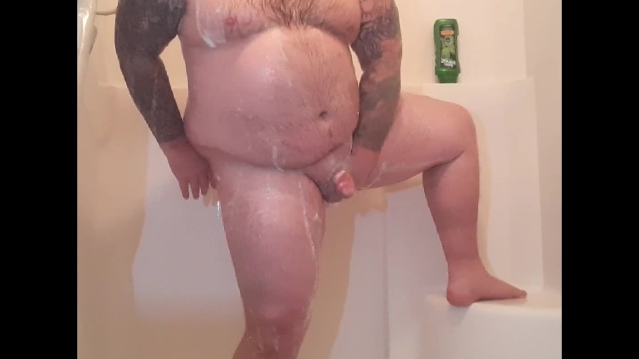Beefy chubby bear soaps up beautiful cock and has moaning orgasm