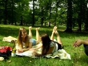 Preview 2 of Two barefoot girls in park having their feet worshiped by a stranger (foot worship, public feet)