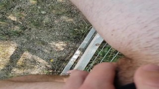 FTM Spraying Pee From Fence