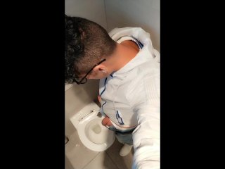 Twink with fat uncut cock piss at a rest stop toilet