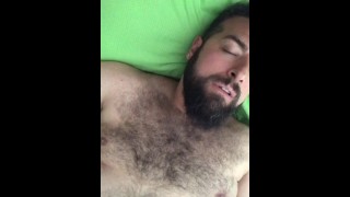 Big horny bearded Italian bear with hairy chest strokes his body