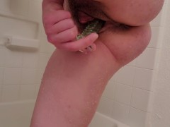 Transguy playing with his bonus hole and clit with a dildo
