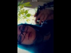 Goth stoner babe smoking a clove cigarette
