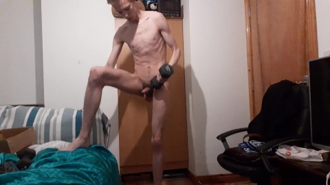 Anorexic teen works out with dumbbells and stretches out his skinny sexy body