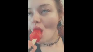 cutie sucks and teases a popsicle 