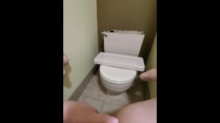 Trying to piss in the back of the toilet. Made a huge mess