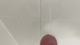 Piss on shower wall