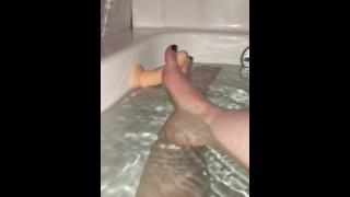 Foot goddess gives dildo a lazy foot job