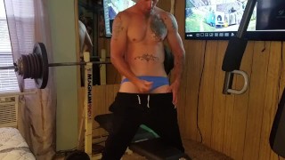 While Working Out A Hot Tattooed Man Shows Off His Ass And Cock