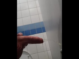 Pissing in a restroom