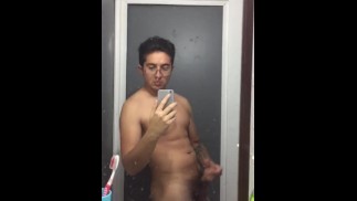 Big dick in front the mirror of a public bathroom didn’t get an erection after cumming twice.