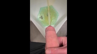 PISSING IN THE URINAL WITH A SOFT UNCUT COCK