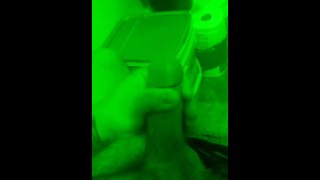 Tattooed guy jerks off with night vision. 