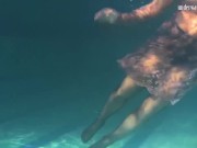 Preview 1 of Dressed underwater beauty Bulava Lozhkova swimming naked