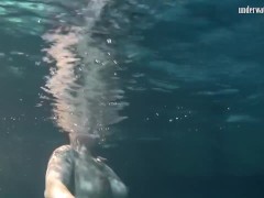 Dressed underwater beauty Bulava Lozhkova swimming naked